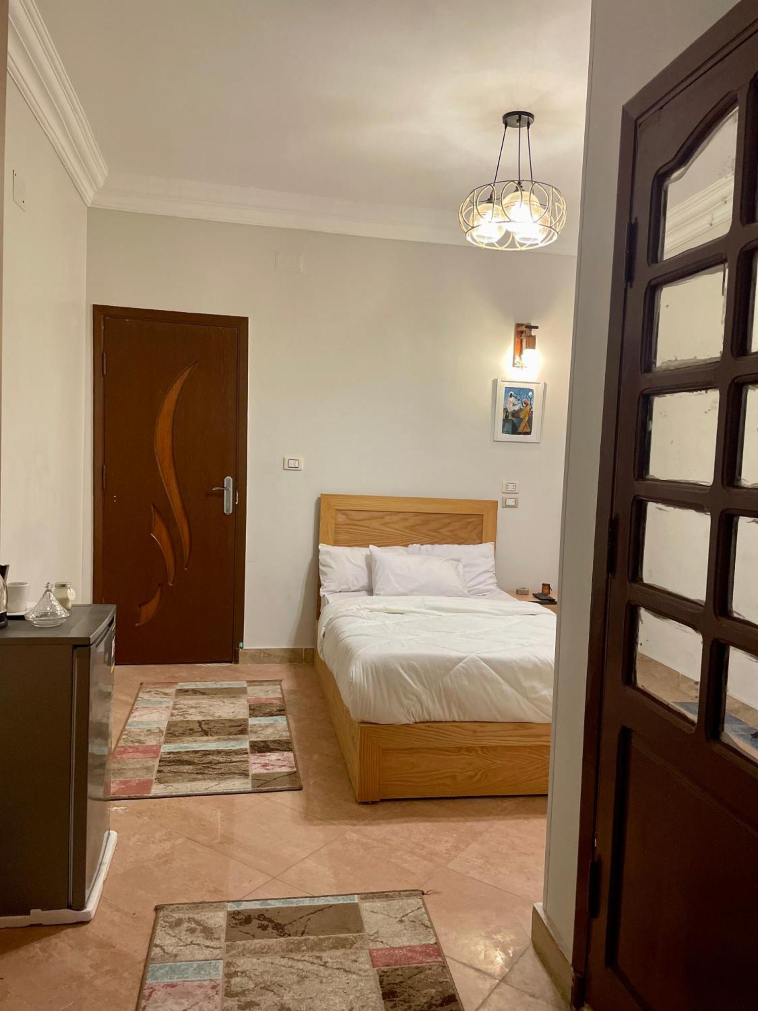 Pyramids Home Inn Кайро Екстериор снимка